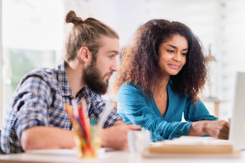 At Office Creative Team At Work A Young Black Woman Shares Ide