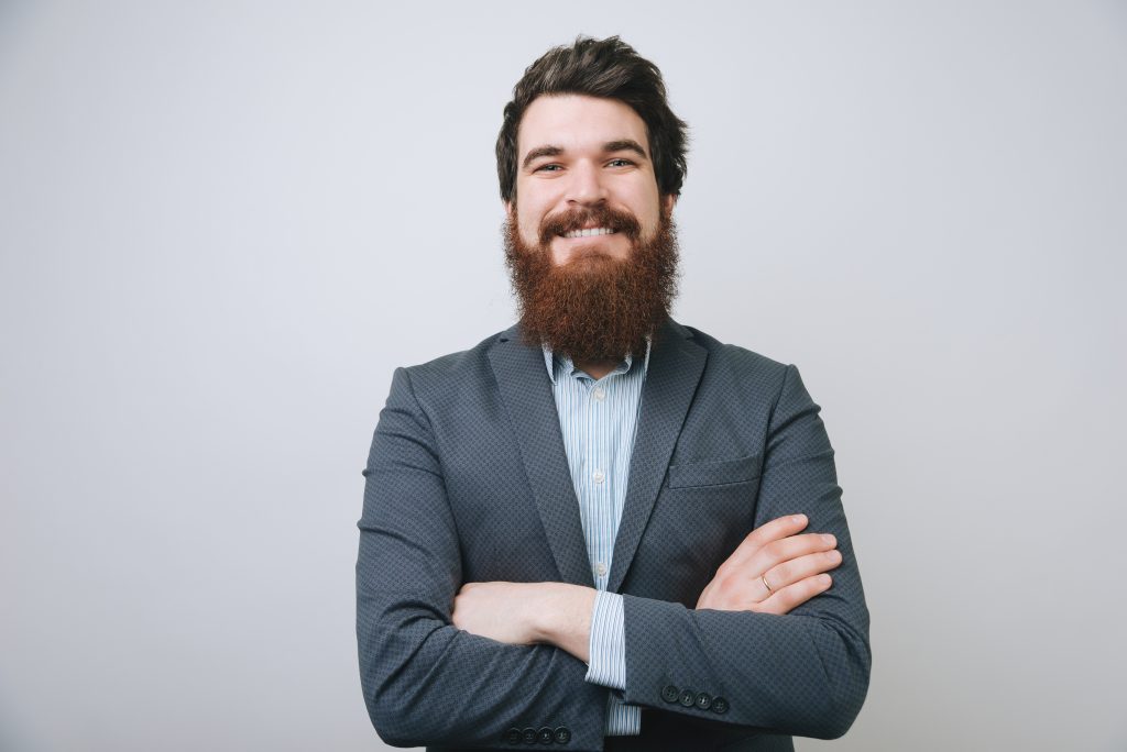 Portrait Of Happy With Beaming Smile Freelancer In Gray Jacket S