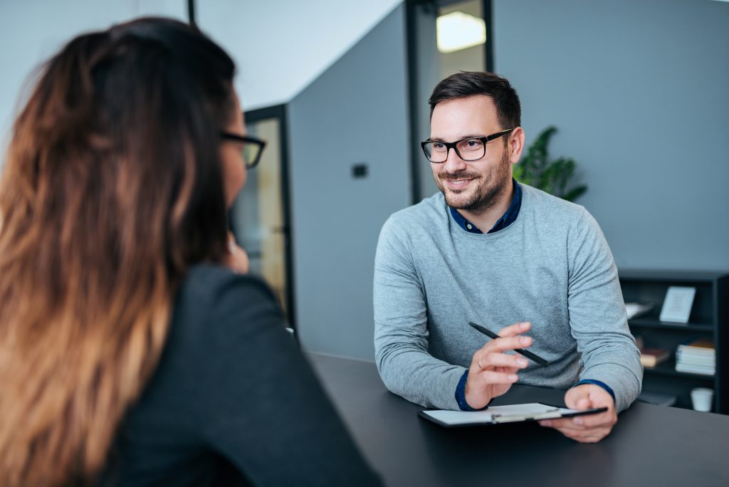 Female Person Having A Job Interview With A Male Recruiter