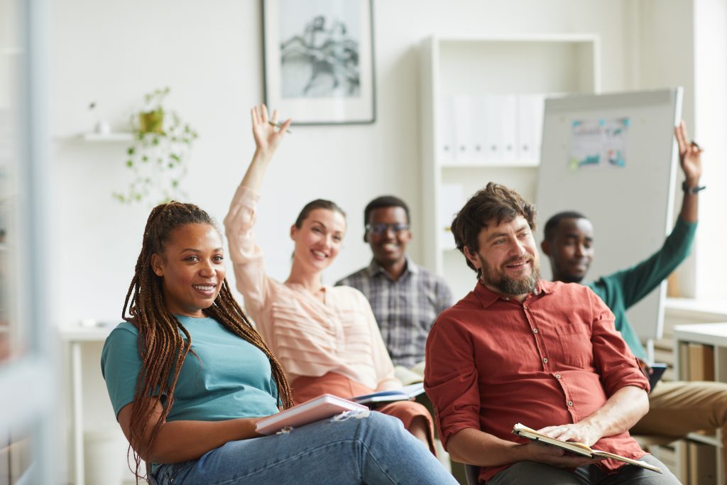 Diverse Business People At Seminar In Audience